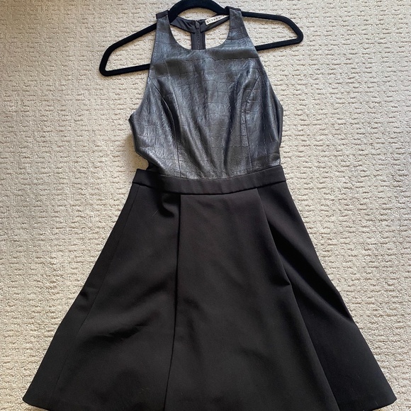 Alice + Olivia Black halter dress with leather top and flared bottom